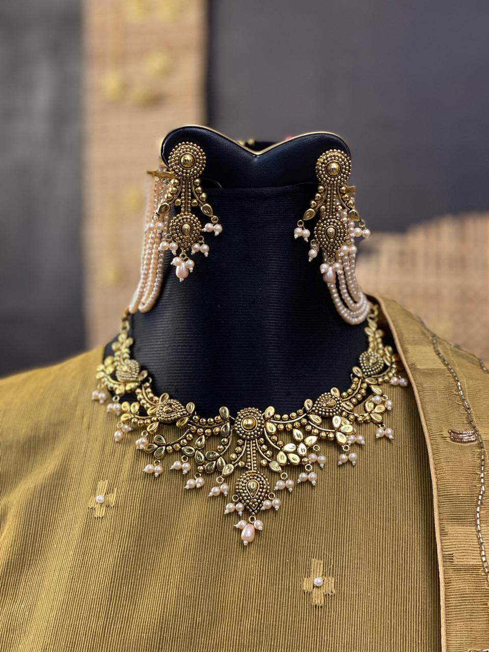 Rohini Paisley Drop Earrings — gold-tone jewellery with pearl-look bead details