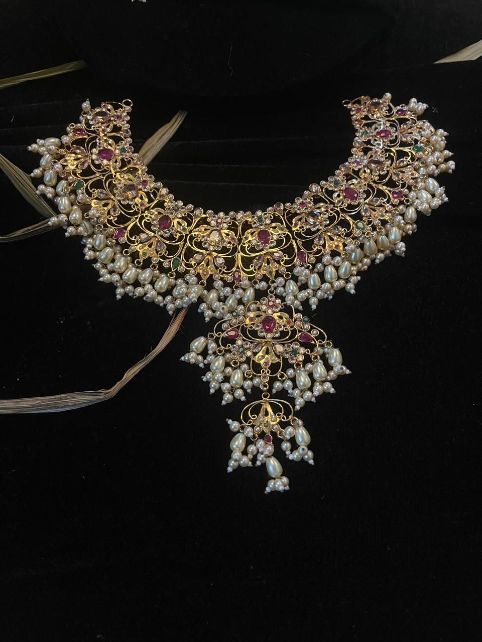 Mahnoor Floral Cascade Necklace — gold-tone jewellery with pearl-look bead details