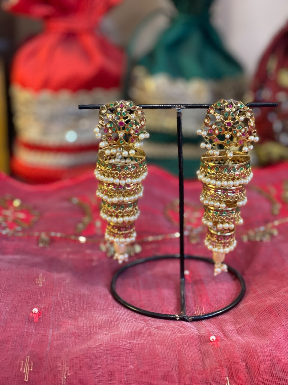 Tiered Floral Drop Earrings in a gold-tone finish with pearl-look bead details