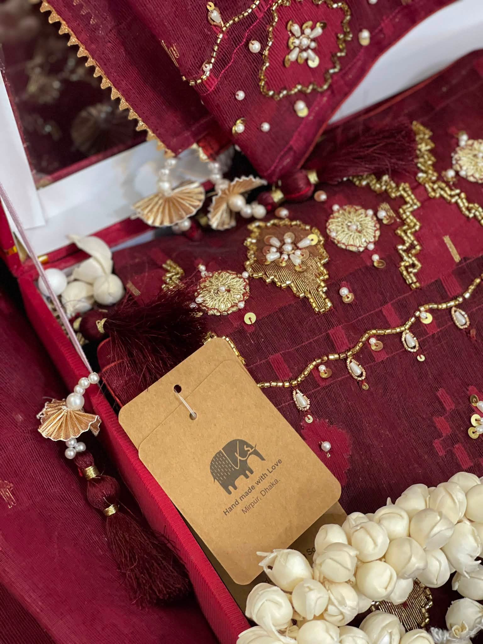 An Ivory Jamdani Tale Saree