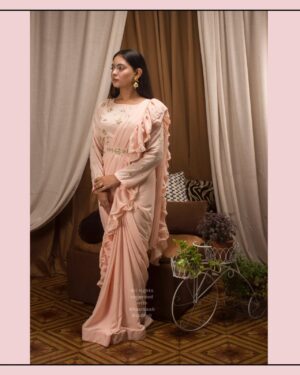 Georgette Saree with Ruffle Frills and Pitta Nakshi Blouse